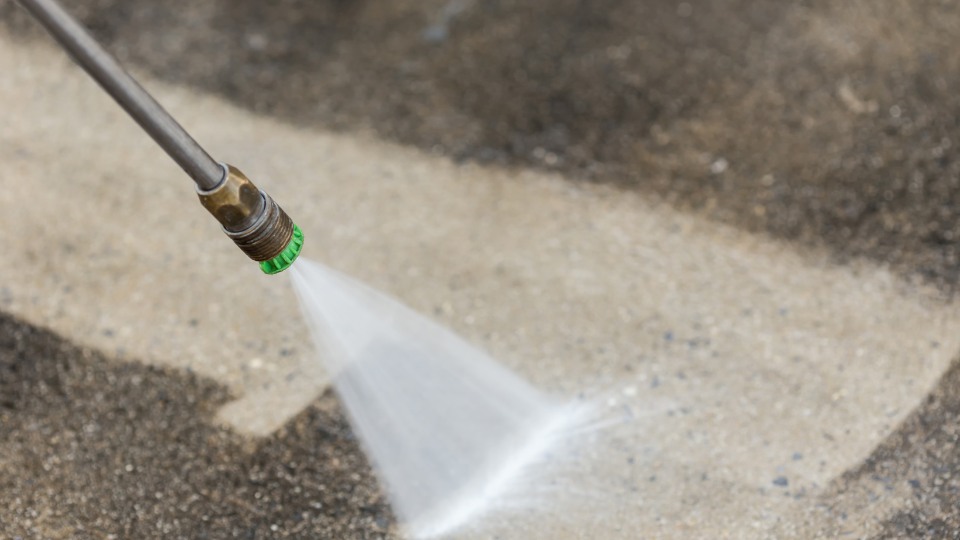 Close-up of spray cleaning nozzles in action.